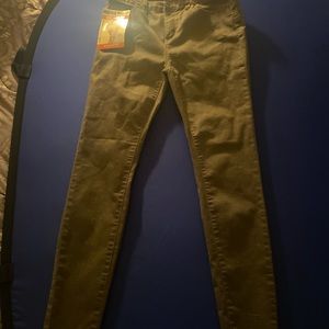 Green tight fitting jeans